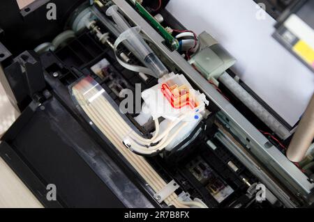 Top view inside the printer repairing a problem color. Stock Photo