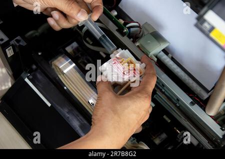 Top view inside the printer repairing a problem color. Stock Photo