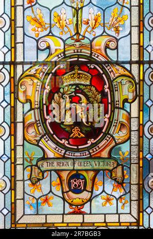 Partial view of a stained glass window commemorating the sixtieth anniversary of Queen Victoria on the British throne on display in Victoria British C Stock Photo