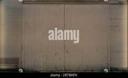 Background for graphic resources template of weathered wood wall and barn door Stock Photo