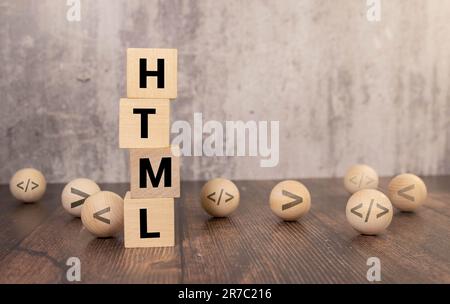 Word HTML on wooden blocks, white background. Business and Finance. Stock Photo