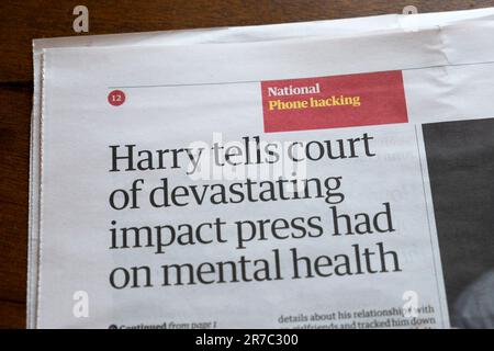 Prince 'Harry tells court of devastating impact press had on mental health' Guardian newspaper headline phone hacking trial article 7 June 2023  UK Stock Photo