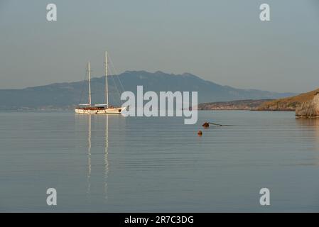 Bodrum, Turkey. April 22nd 2022 Stunning calm seascape with a luxury yacht moored at the Gulf of Gokova in Bodrum, Mugla on the south west coast of Tu Stock Photo