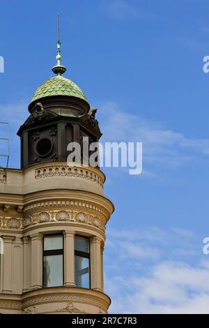 Prague, Czech Republic. 10.05.2019: Close-up view of the facade with windows of old historical buildings in Prague. Retro, old-fashioned, vintage, las Stock Photo