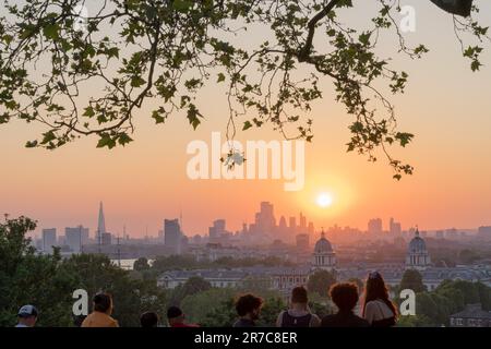 London UK. 14th June 2023. UK Weather. view of central London skyline in the distance at sunset on a hot summer day in Greenwich park, London England. Credit: glosszoom/Alamy Live News Stock Photo