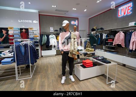 SHENZHEN, CHINA - 27 NOVEMBER, various apparel in Lacoste store at COCO Park in District Stock Photo - Alamy