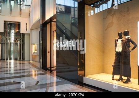 ABU DHABI, UAE - CIRCA JANUARY, 2020: two dressed mannequins dipslayed at Chanel store in shopping center in Abu Dhabi. Stock Photo