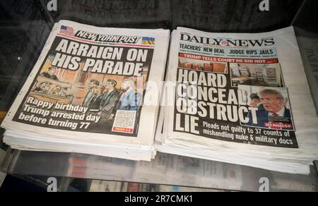 Covers of the New York Post and Daily News on Wednesday, June 14, 2023 report on the previous days arraignment in Florida of former Pres. Donald Trump on 37 counts related to the mishandling and willful retention of classified documents discovered in his Mar-a-Lago resort. (© Richard B. Levine) Stock Photo
