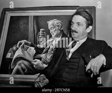 New York, New York,  April 5, 1941 Artist Thomas Hart Benton, seated in front of his painting, 'Old Man Reading', astounded gallery directors today by saying he would rather hang his pictures in saloons and bawdy houses than in fine museums. Stock Photo