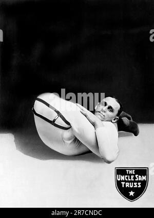 Buffalo, New York:  c. 1920. A contortionist puts his legs behind his back in an ad for the Uncle Sam Truss Company Stock Photo