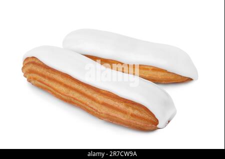 Two delicious eclairs covered with glaze isolated on white Stock Photo