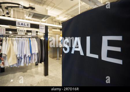 BANGKOK, THAILAND - CIRCA JANUARY, 2020: close up shot of sale sign seen at A land store in Siam Center shopping centre. Stock Photo