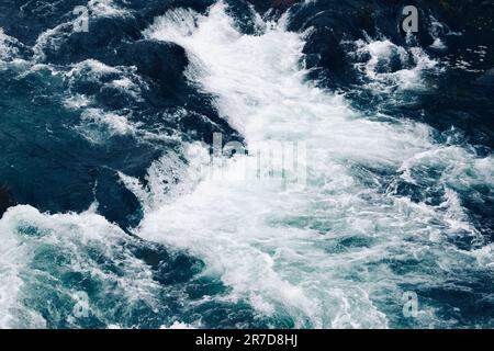 White water rapids and beautiful blue water Stock Photo