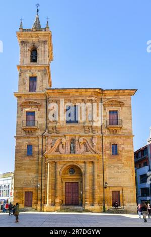 Oviedo, Spain - February 12, 2023: A building with a bell tower, viewed from a low angle. The structure is a local landmark attracting tourists intere Stock Photo