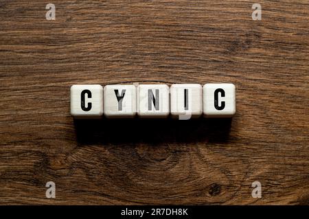 Cynic - word concept on building blocks, text, letters Stock Photo