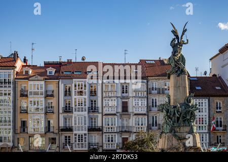 Vitoria-Gasteiz, Spain - 26 March 2023: War memorial on the Plaza Virgen Blanca from behind with the view of facades of houses Stock Photo