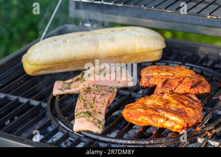grilled steaks and salmon on the grill Stock Photo