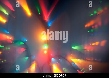 Abstract use of bokeh blur vivid colors for background, abstract backdrop. Bokeh light, flickering blurry multicolored lights on dark. Abstract blurre Stock Photo