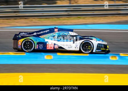 The Peugeot 9X8 race car No. 93, from the Peugeot TotalEnergies team, on the Circuit de la Sarthe race track during the 24 hours of Le Mans. Stock Photo