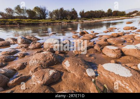 Background with river and stone shore Stock Photo