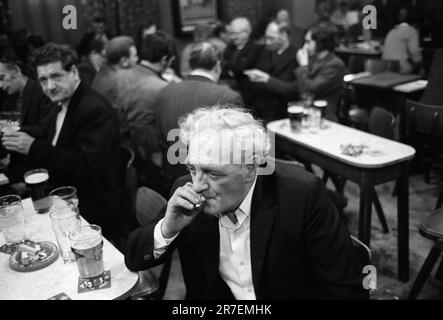 Byker and St Peters Working Men's Club,  Saturday night out, a pint of beer and smoking a cigarette. Newcastle upon Tyne, Tyne and Wear,  northern England circa 1973. 1970S UK HOMER SYKES Stock Photo