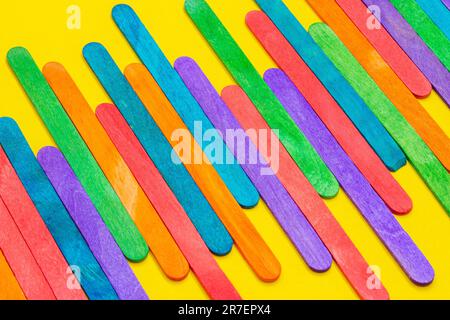 Colorful Popsicle Sticks Over White Background With Copy Space