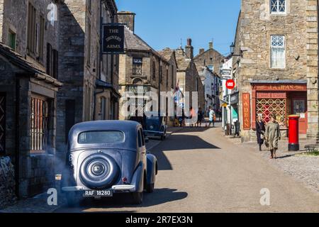 Grassington, Yorkshire Dales, UK 14th June 2023. Cast and crew of the popular Channel 5 and PBS re-make of All Creatures Great and Small were out in force filming for the series 4 Christmas special.   Credit: Tom Holmes / Alamy Live News Stock Photo