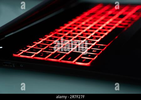 Gaming laptop keyboard with led red light Stock Photo