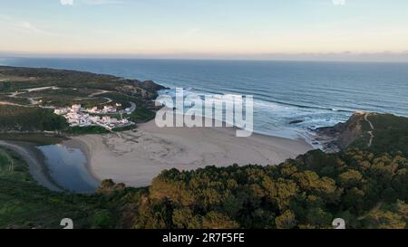 Aerial view of Praia de Odeceixe along Ribeira de Seixe river, Odeceixe, Faro, Portugal. Stock Photo