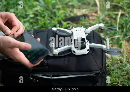 Man Checking a Drone Stock Photo