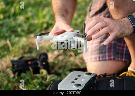 Man Checking a Drone Stock Photo