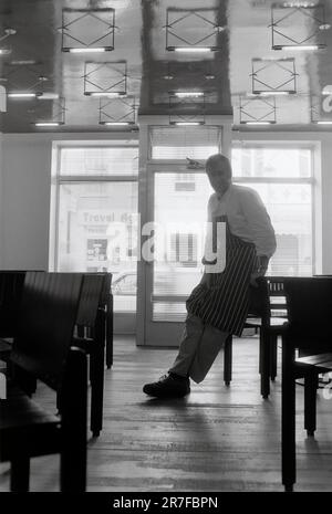 Alastair Little, chef, inside his restaurant in Frith Street, Soho, London, UK June 1987. Stock Photo