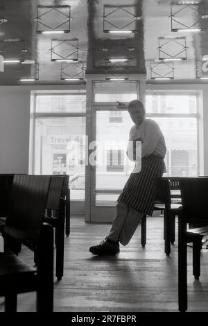 Alastair Little, chef, inside his restaurant in Frith Street, Soho, London, UK June 1987. Stock Photo