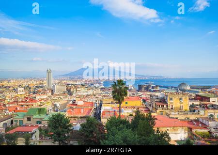 Naples, Italy. View of the city from above, from Corso Vittorio Emanuele street. In the distance Mount Vesuvius and the Port of Naples. 2023-01-03.