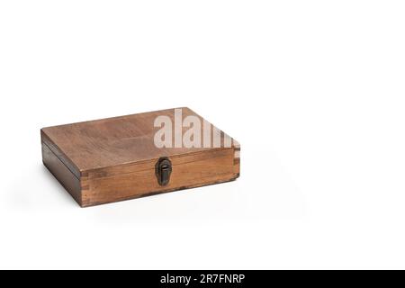 A brown wooden box on a white background with copy space Stock Photo