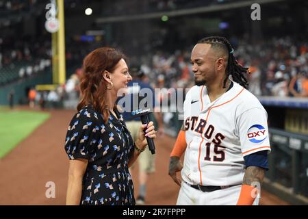 Houston Astros catcher Martin Maldonado (15) is interviewed by Julia Morales after the MLB game between the Washington Nationals and the Houston Astro Stock Photo