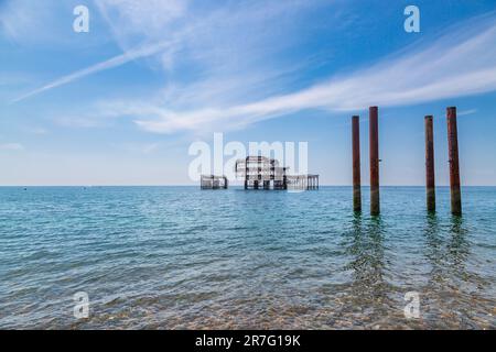 A view of the old West Pier off the coast at Brighton, on a sunny summer's day Stock Photo