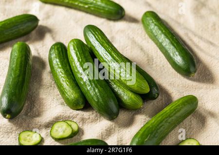 Green Raw Organic Mini Baby Cucumbers Ready to Eat Stock Photo