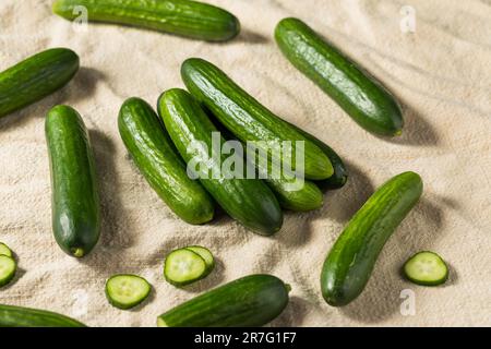 Green Raw Organic Mini Baby Cucumbers Ready to Eat Stock Photo