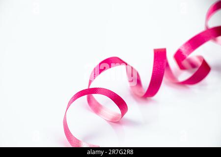 Twisted Pink Velvet Ribbon Isolated On White Stock Photo