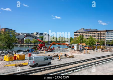 Hakaniemenranta under construction with new tramway or light rail tracks in Hakaniemi district of Helsinki, Finland Stock Photo