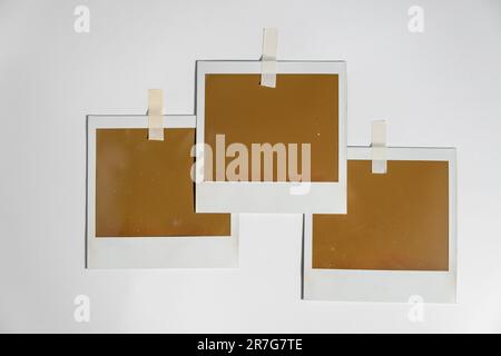 Three blank photo frames on white background. Stock Photo