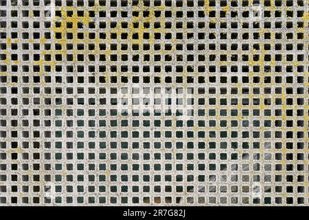 Detail shot of a weathered grid plate Stock Photo