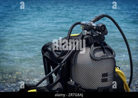 Close-up of an oxygen cylinder for diving on a clean beach Stock Photo