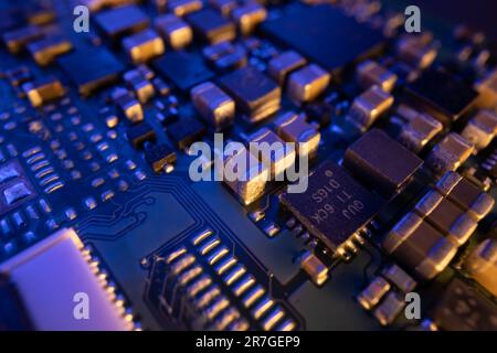 Computer chip on a part of electronic printed circuit board close up Stock Photo