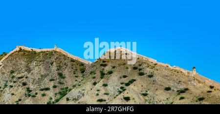 old historic fortification wall at the hills around Jagmandir fort in Amber, Jaipur, India Stock Photo