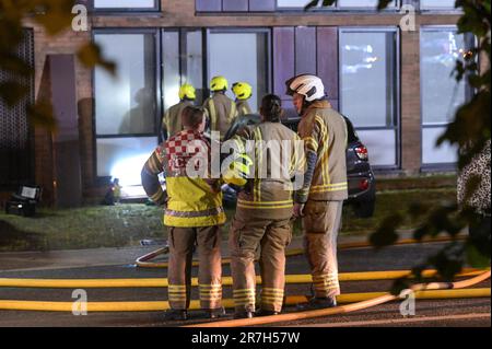 Church Road, Edgbaston, Birmingham 15th June 2023 - West Midlands Fire Service tackled a severe fire in a student halls of residence on Thursday evening. Forty-five firefighters raced to Vale Village, a residential area owned by the University of Birmingham. A 4th floor kitchen in ‘Chamberlain C' which fronts Church Road in the Edgbaston area of the city was blackened out by the blaze and smoke with firefighters seen inside the property using flashlights to investigate the cause of the incident. The heat of the fire broke the internal panes of the double glazed windows however the fire only br Stock Photo