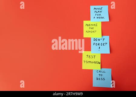 Many different reminder notes on orange background, flat lay. Space for text Stock Photo