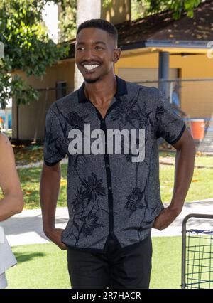 MIAMI, FL - JUNE 15: Actor Mamoudou Athie star of Disney and Pixar’s “ELEMENTAL” surprise kids at Boys and Girls Club of Miami on June 15, 2023 in Miami, Florida.  (Photo by Alberto E. Tamargo/Sipa USA) Stock Photo