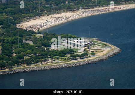 Close view of Flamengo beach shoreline and Flamengo park green areas with Guanabara bay waters at it, facing the Atlantic Ocean under summer sunny day. Stock Photo